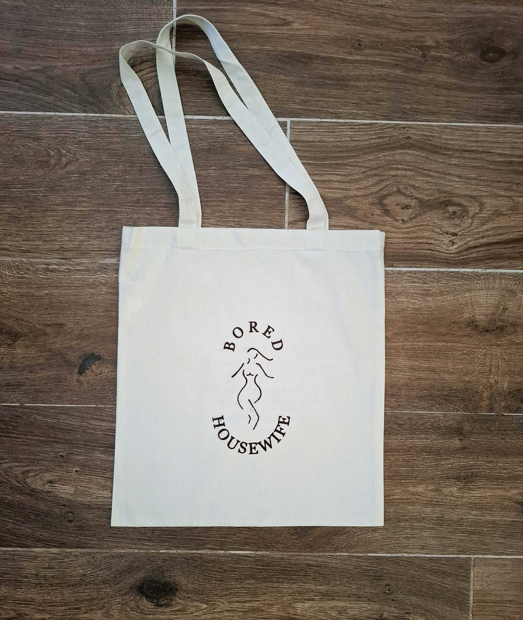 Bored Housewife Tote bags