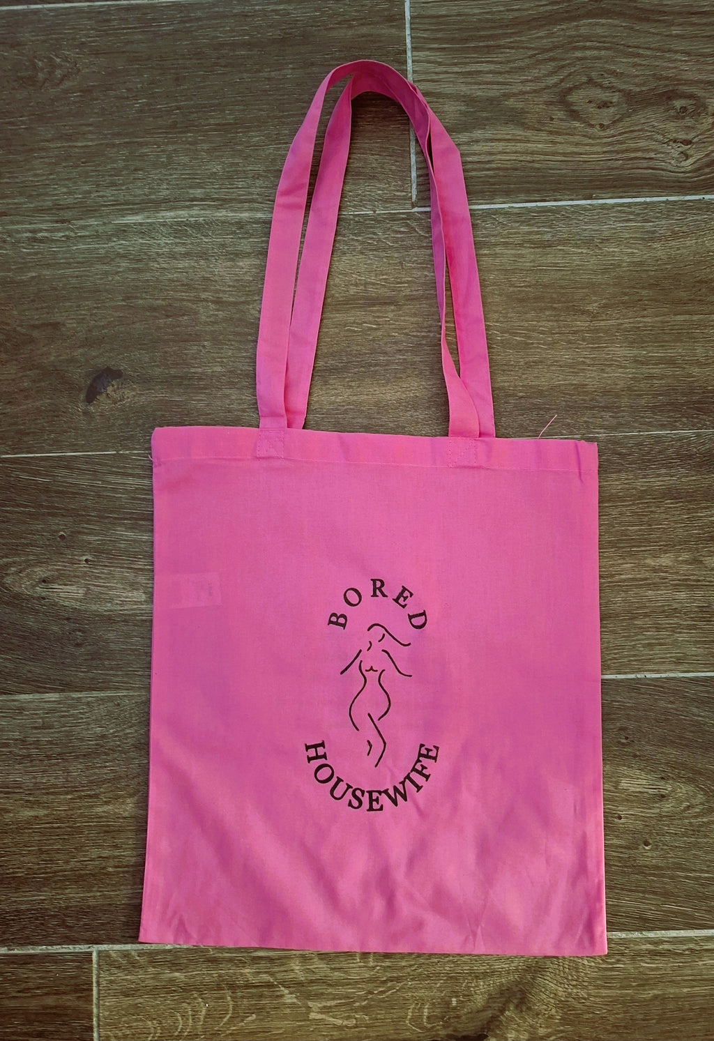 Bored Housewife Tote bags