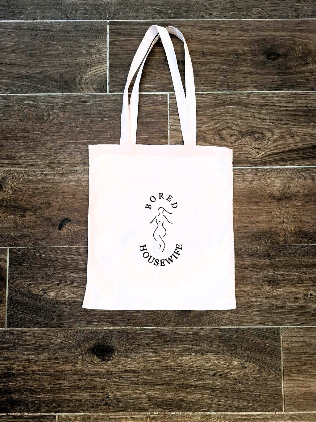 Bored Housewife Tote bags